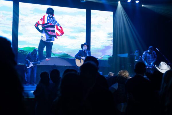 Clint Black on stage performing at the Vogel Alcove Annual Arts Performance Event